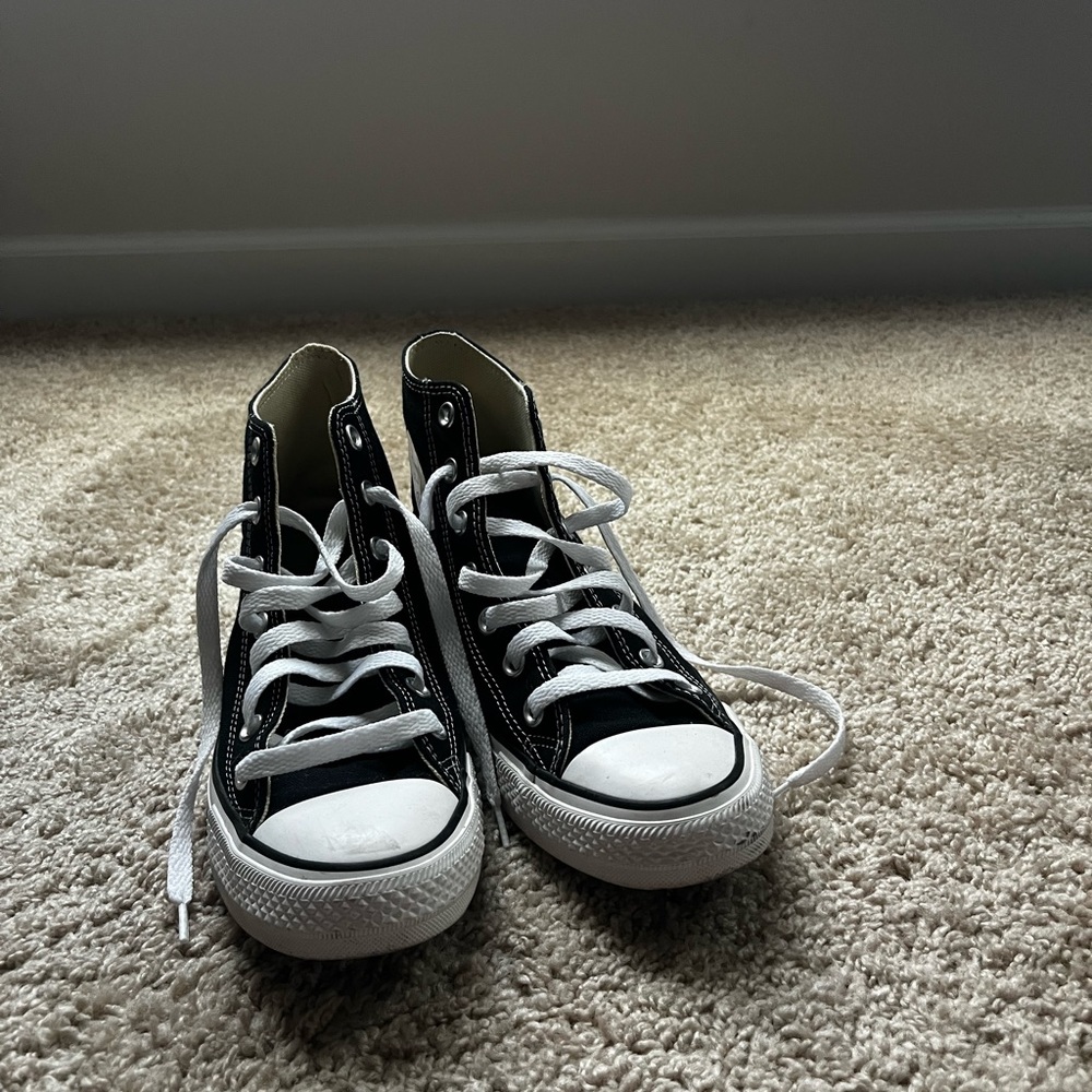Black high-top converse